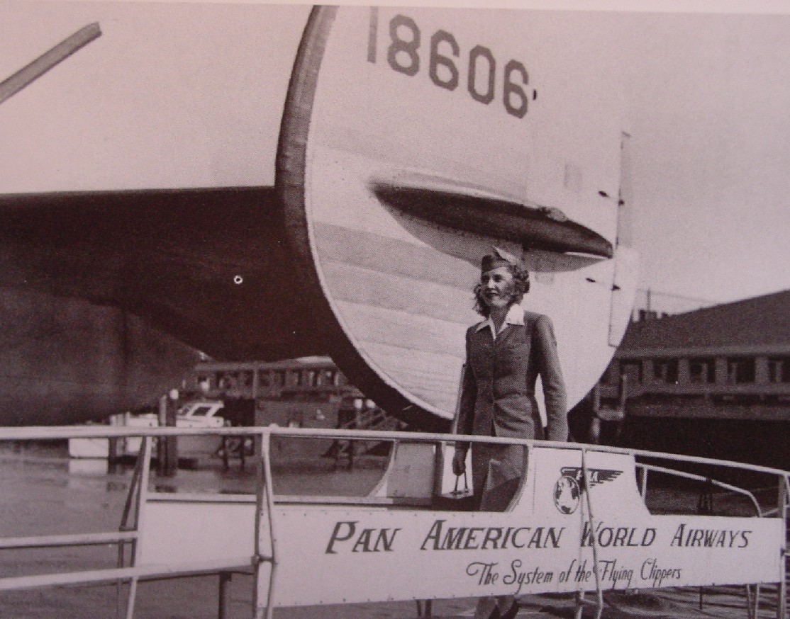 1940s Pan Am's first stewardess Madeline Cuniff boarding a Boeing 314 flying boat.